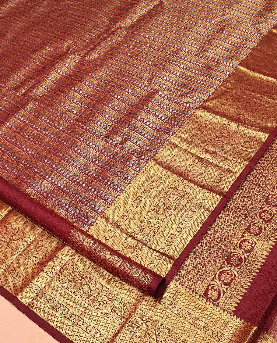 Maroon Kanchipuram Designer Silk Saree, Enriched with Geometric Jacquard Designs, Zari Border of Manga Mokku, Vanki, and Kodi Visiry Designs, Jaal Pallu, and a Matching Blouse