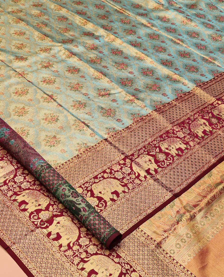Blue Kanchipuram Tissue Silk Saree, Artfully Detailed with Floral Jacquard, Complemented by a Contrast Border of Jaal and Elephant Designs, Jaal Pallu, and a Contrast Blouse