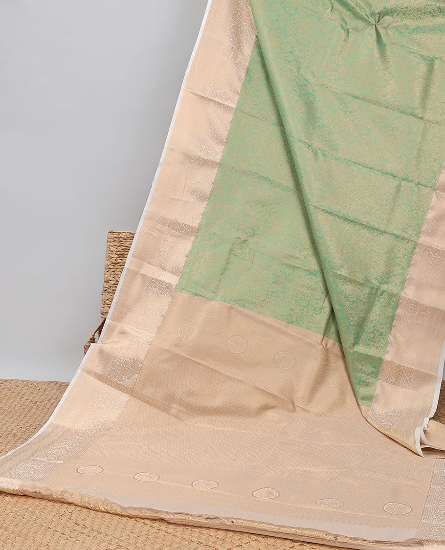 Green floral jacquard budget silk saree with contrast floral zari design border & intricate zari design pallu