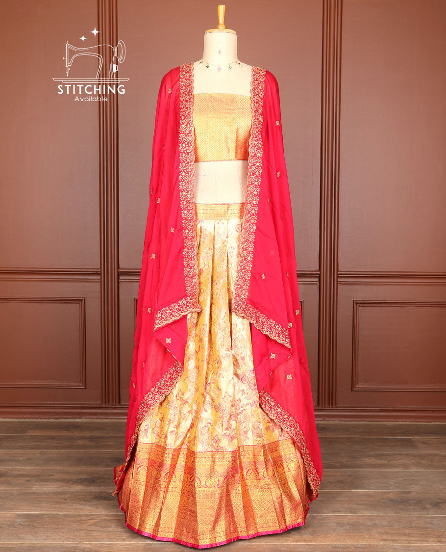 Orange floral jacquard half saree with contrast intricate zari design border, zari design blouse & floral embroidery scallop border dhavani