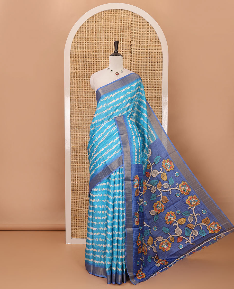 Sky blue uniquely printed soft tussar saree, contrast zari border, kalamkari floral vine printed pallu & kalamkari printed blouse