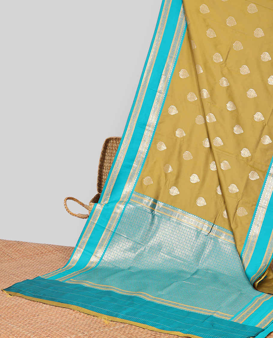 Ligth brown leaf buttas semi-soft silk saree with contrast traditional zari designb order & argyle design pallu