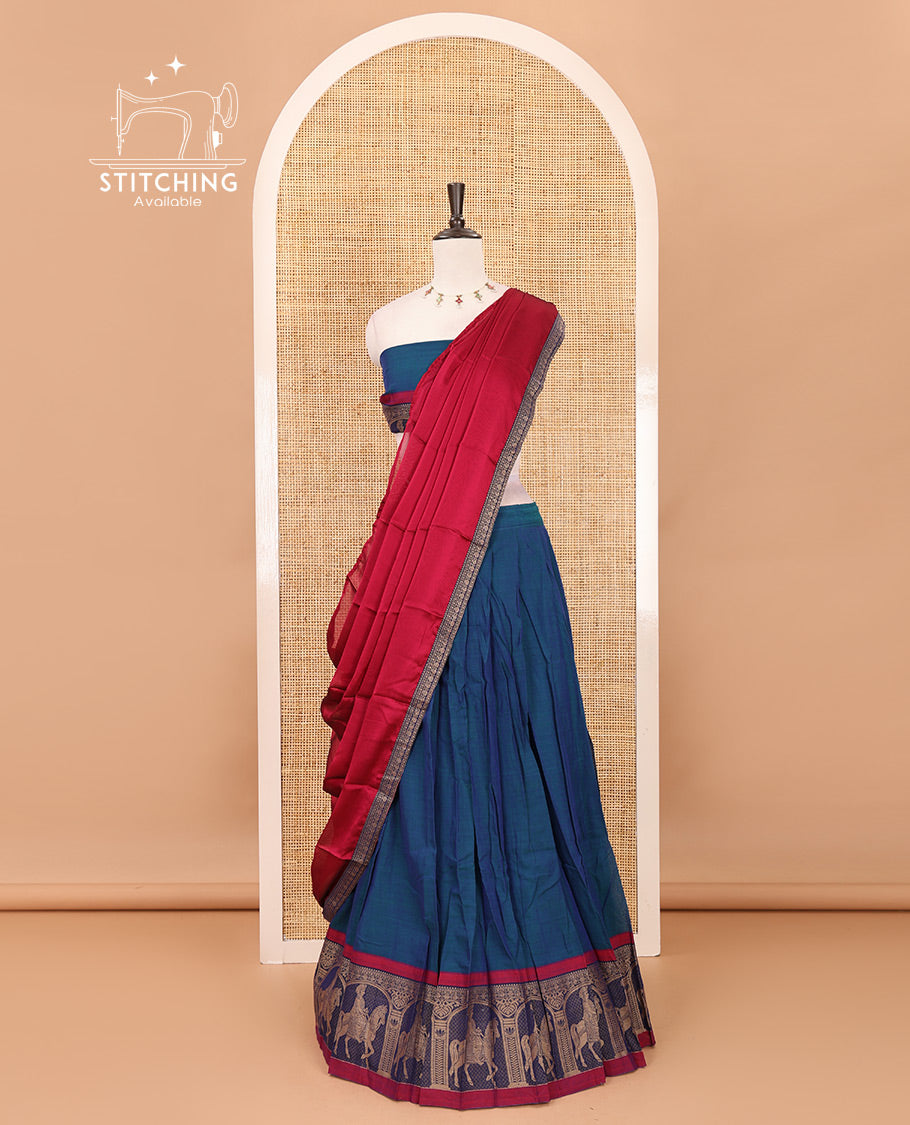 Blue with maroon mercedised cotton half-saree, contrast elephant zari border skirt, matching blouse & one side border georgette dhavani