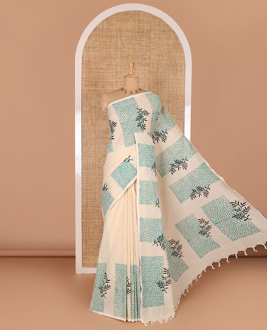 Cream plain South cotton saree, floral and honey hive printed border, a matching printed blouse, and a contrast floral vine printed blouse