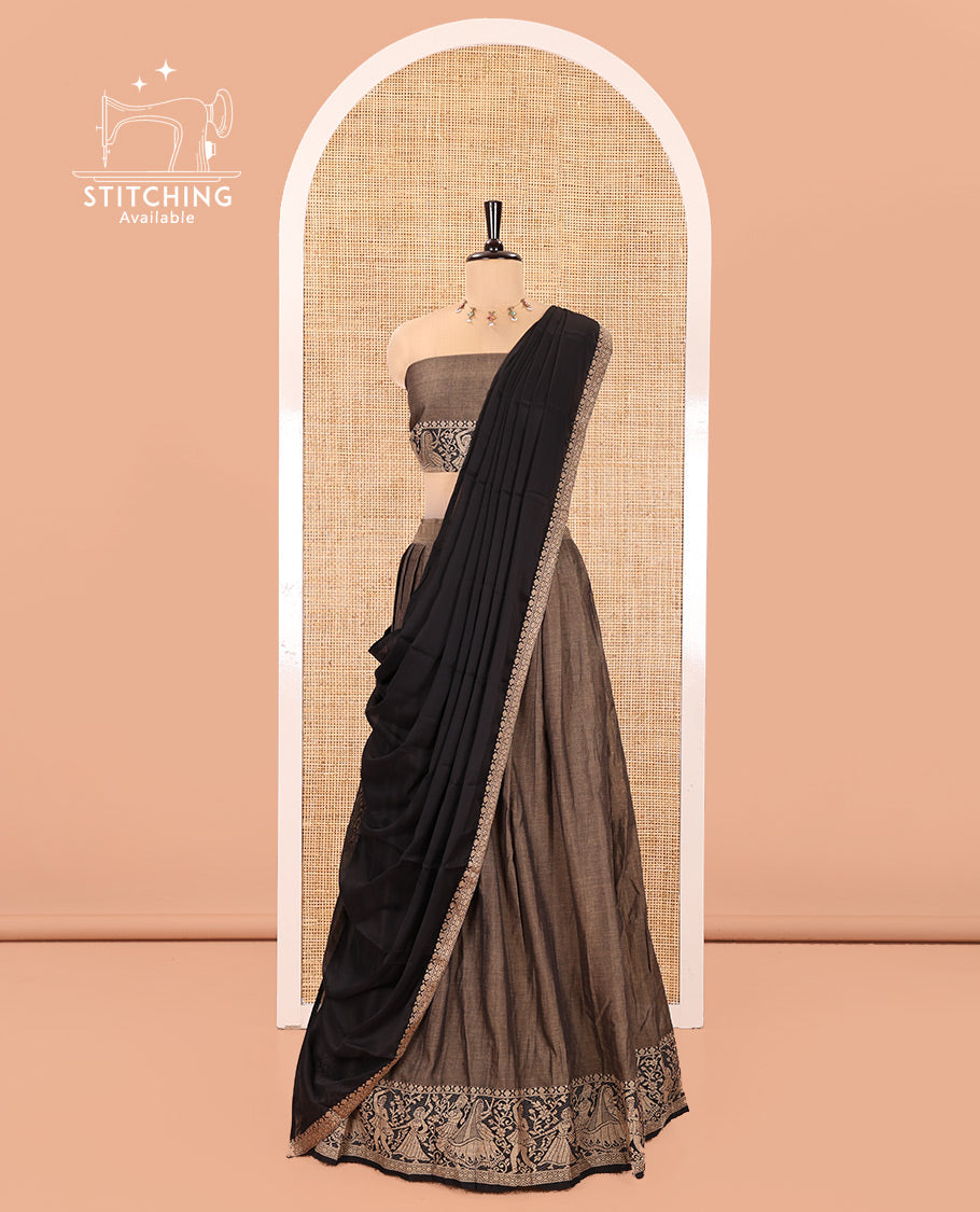 Chikku and Black Mercerised Cotton Half-Saree Set, Plain with Dancing Figurines Woven Bordered Skirt, Paired With a Matching Blouse, and Comes with a Contrast Dhavani