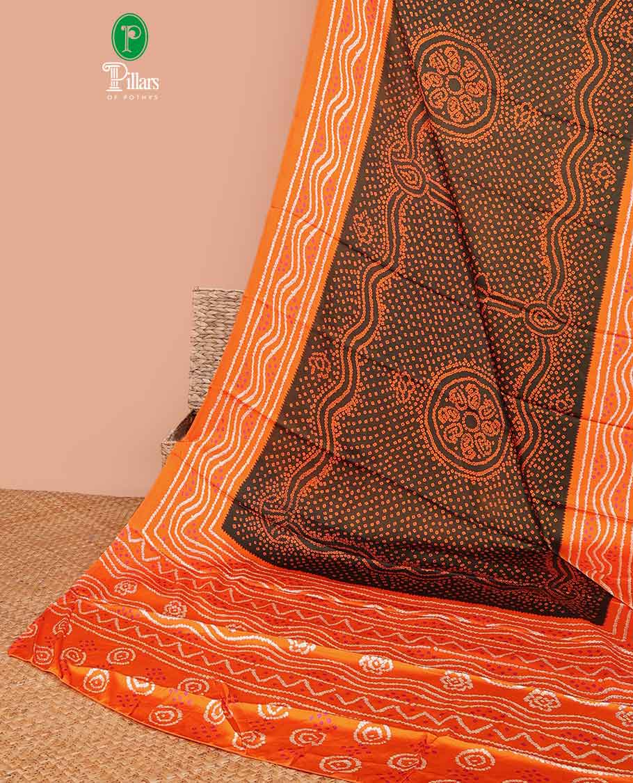 Brown all over bandhani printed crepe silk saree with contrast bandhani printed border