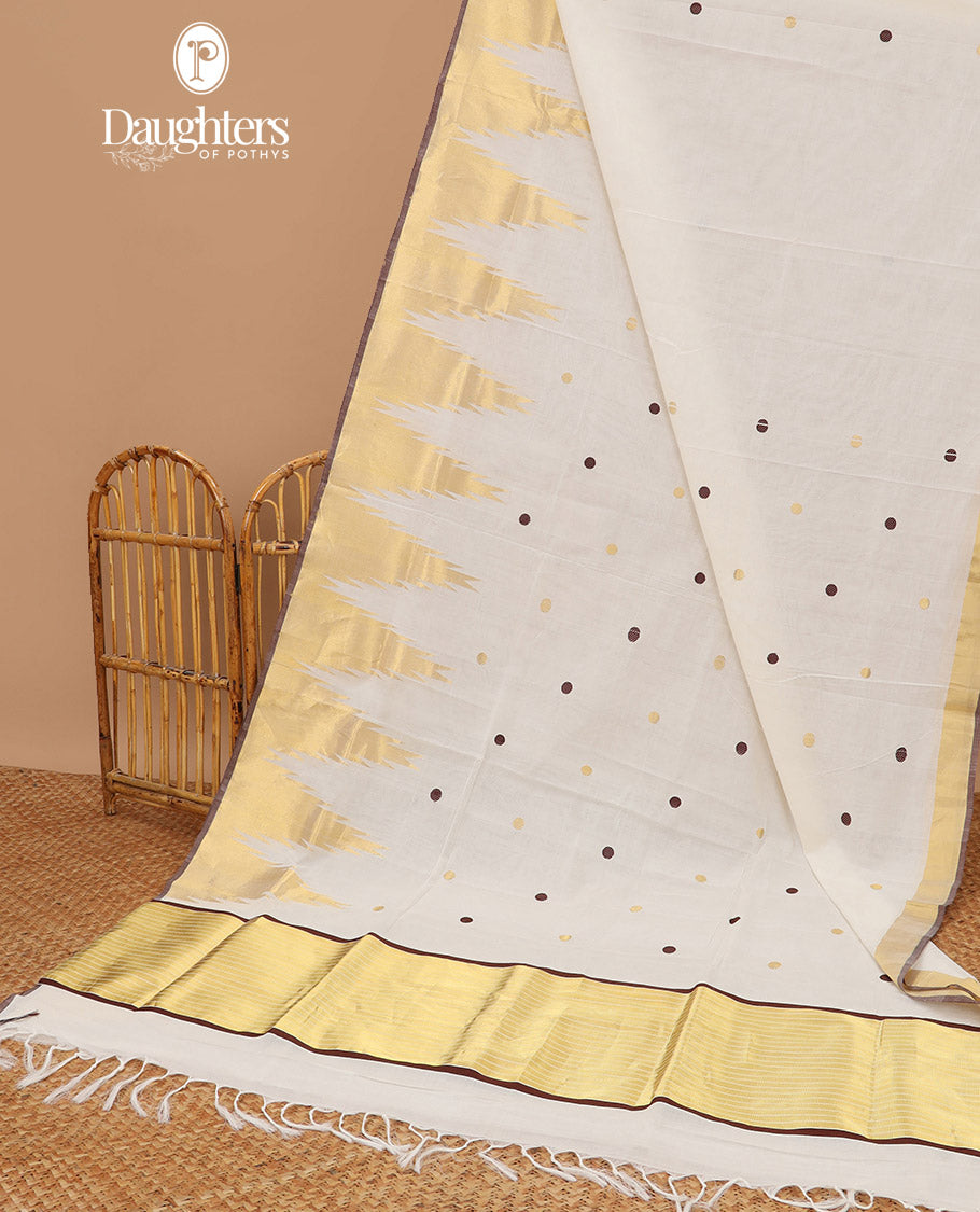 White polka dot kasavu saree with self temple border & striped pallu, brown border