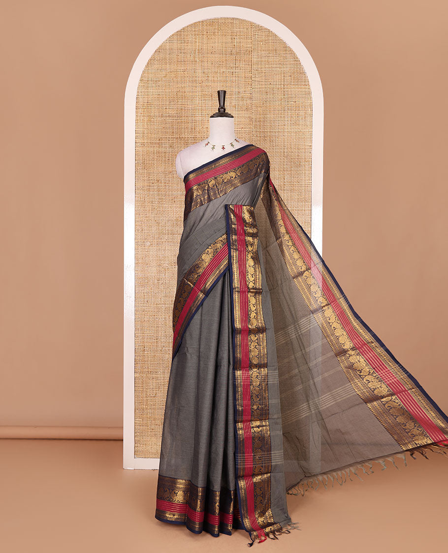 Grey plain Chettinad cotton saree, contrast rettai rettu annam and temple motif zari border, striped pallu, and matching blouse