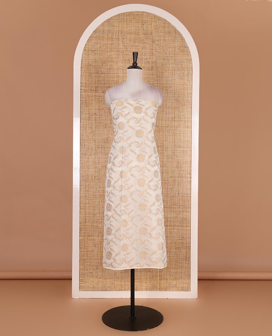 Cream with peach semi-chanderi material churidar set, floral jaal jacquard top, contrast taffeta silk bottom, and jamdani style dupatta