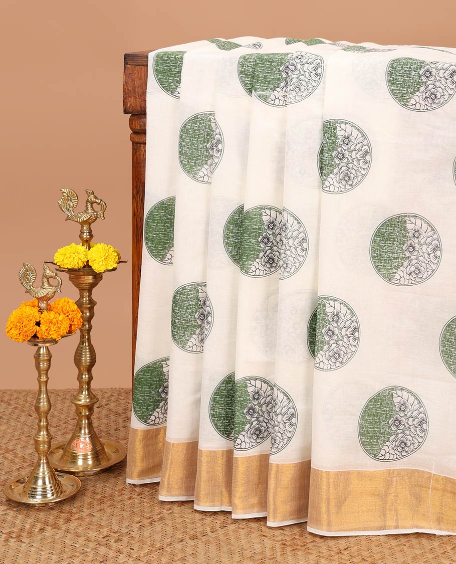 Cream with green flower butta kerla cotton saree with zari bawanchi border & printed pallu along with plain blouse