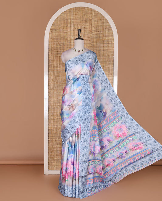 Blue colorful, floral printed turkey crepe saree, floral printed border, pallu, and contrast flower motifs printed blouse