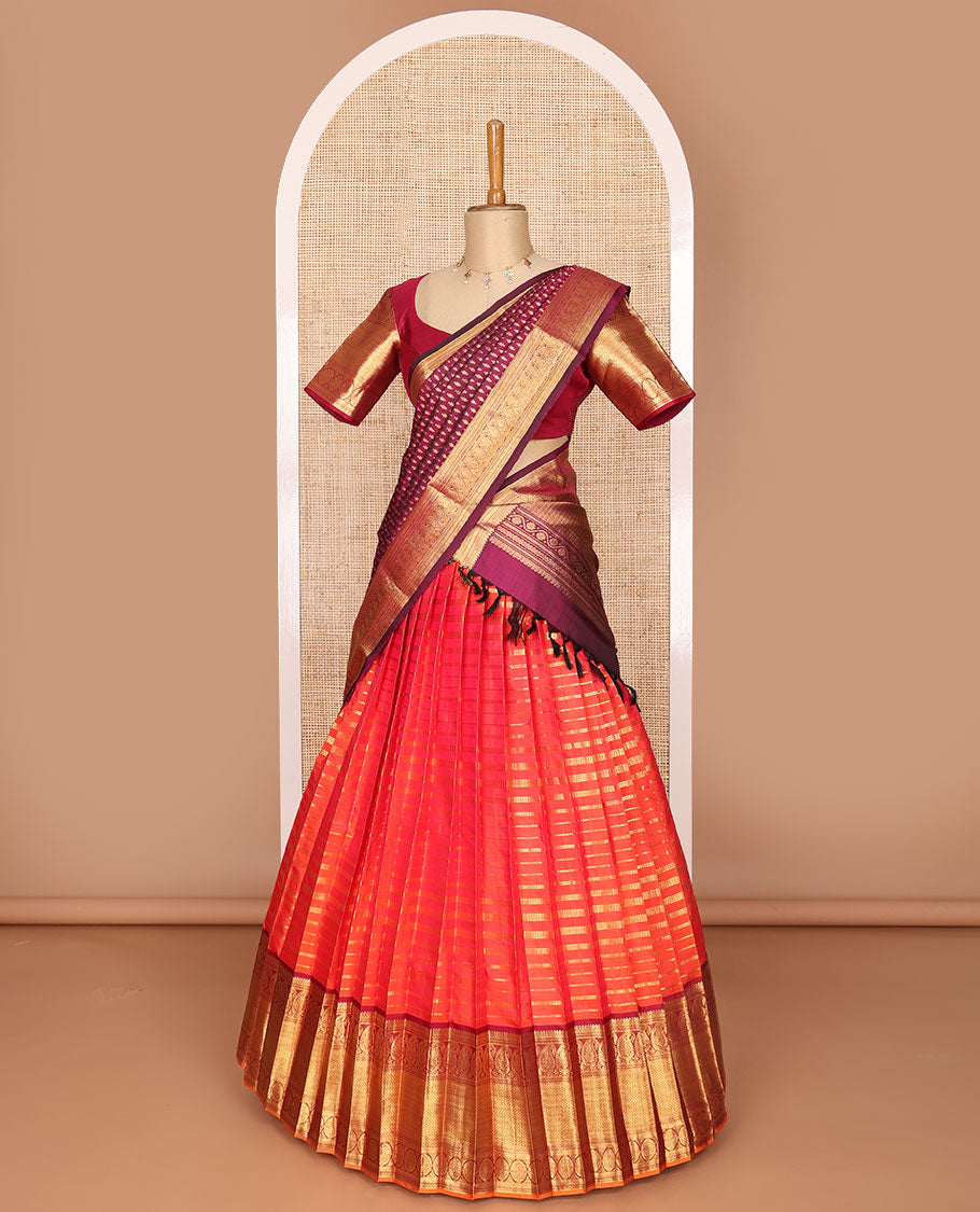 Orange striped readymade silk half saree with contrast intricate zari design border, floral design blouse & floral design dhavani