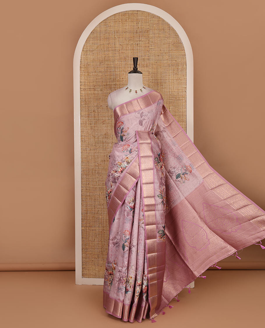 Light pink tropical floral printed fancy tussar saree, contrast traditional zari border, intricate zari woven pallu, and matching printed blouse