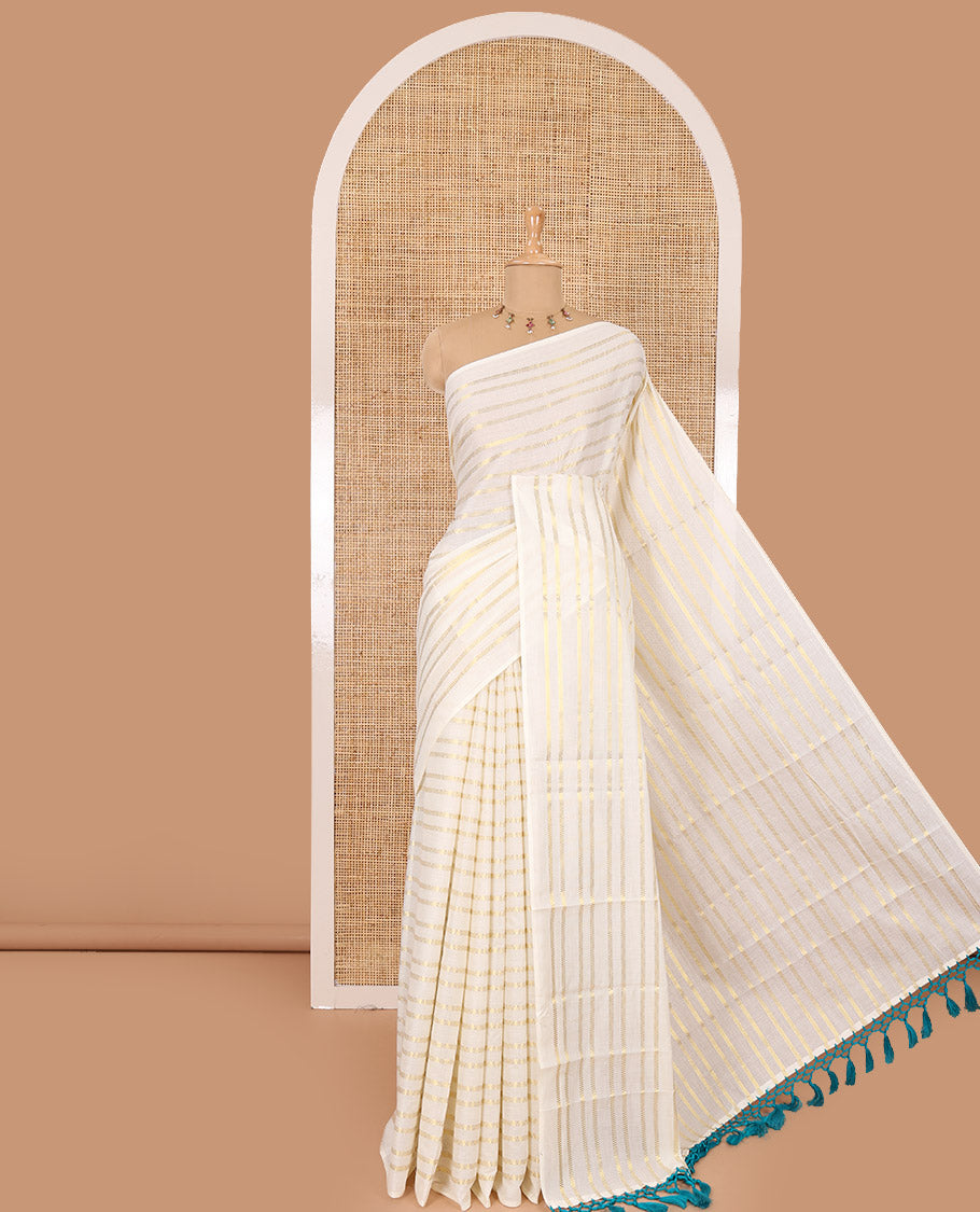Borderless cream and ramar blue horizontal zari muthu striped Kerala cotton saree, self-pallu with tassels and a matching blouse