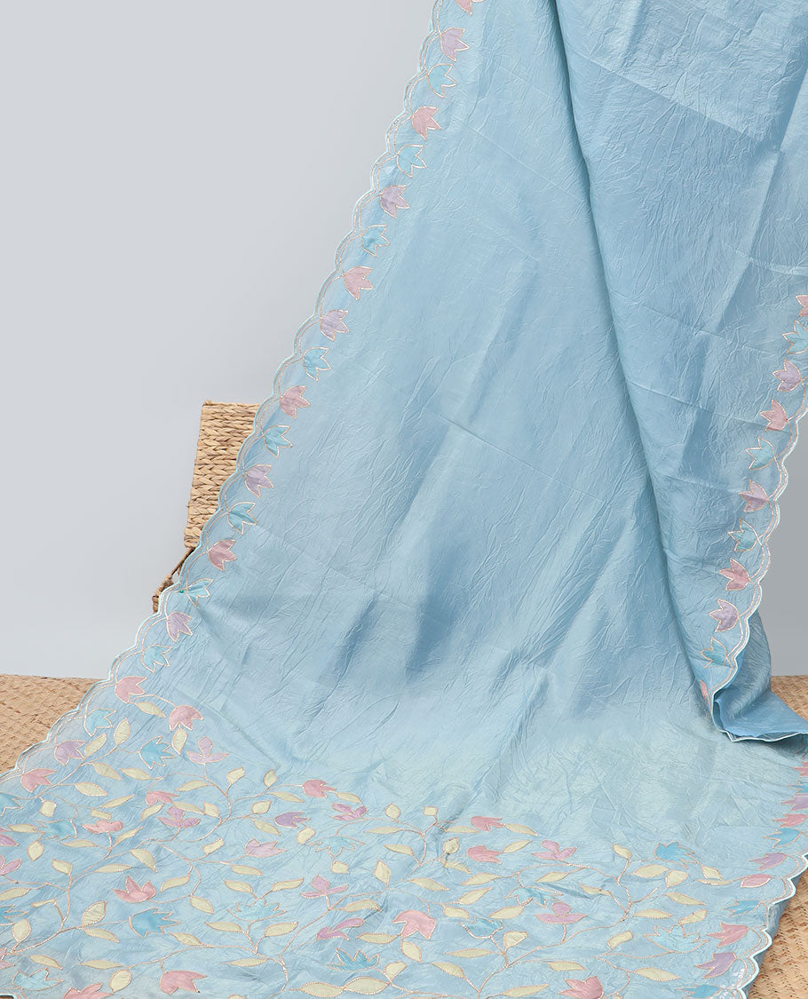 Light blue tissue saree with self scallop border & floral embroidery pallu