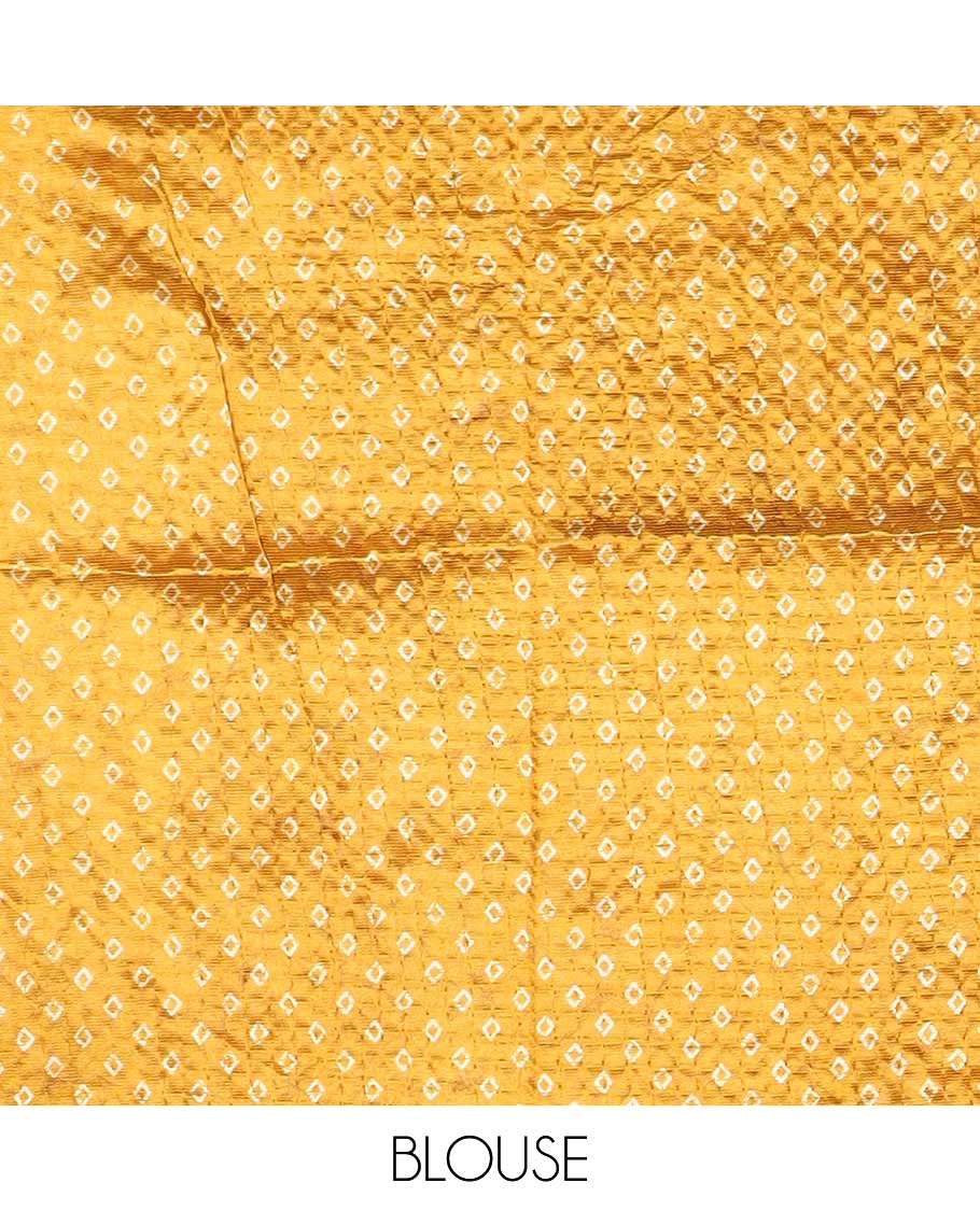 Mustard batik-floral buttas printed litchi crushed saree, batik-floral printed border, printed pallu & butta print blouse