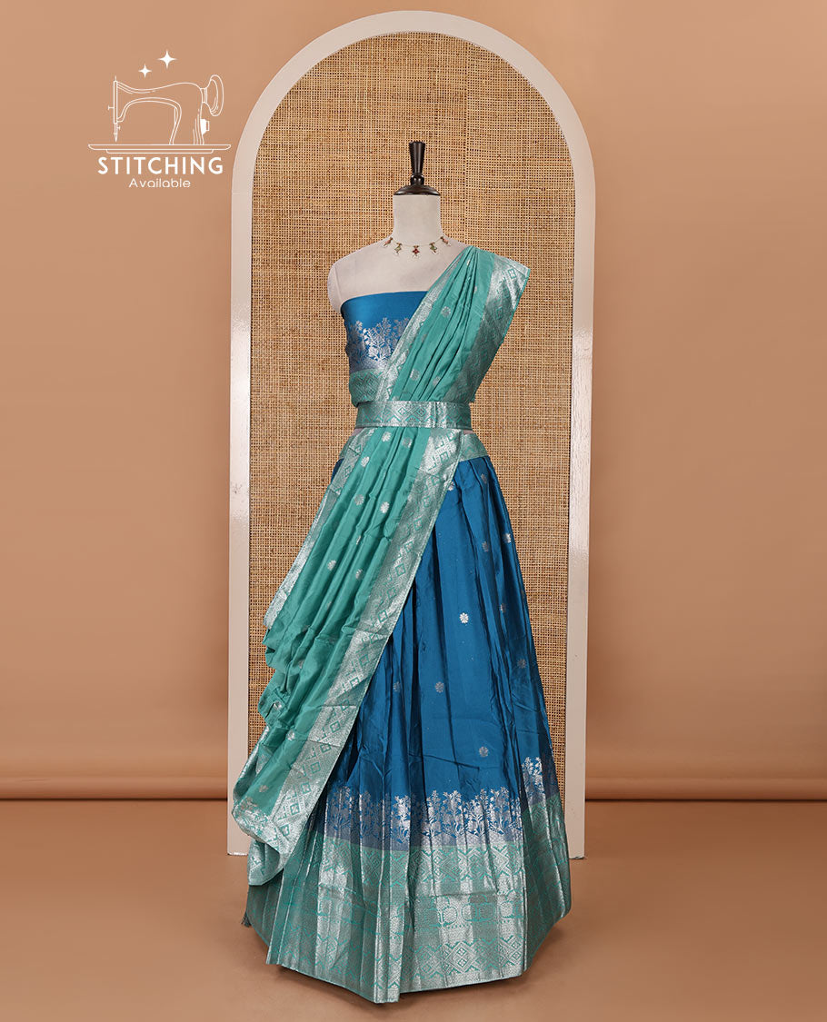 Blue-green taffeta silk half-saree, zari buttas & contrast floral-geometric zari border skirt, zari woven blouse & contrast zari woven dhavani