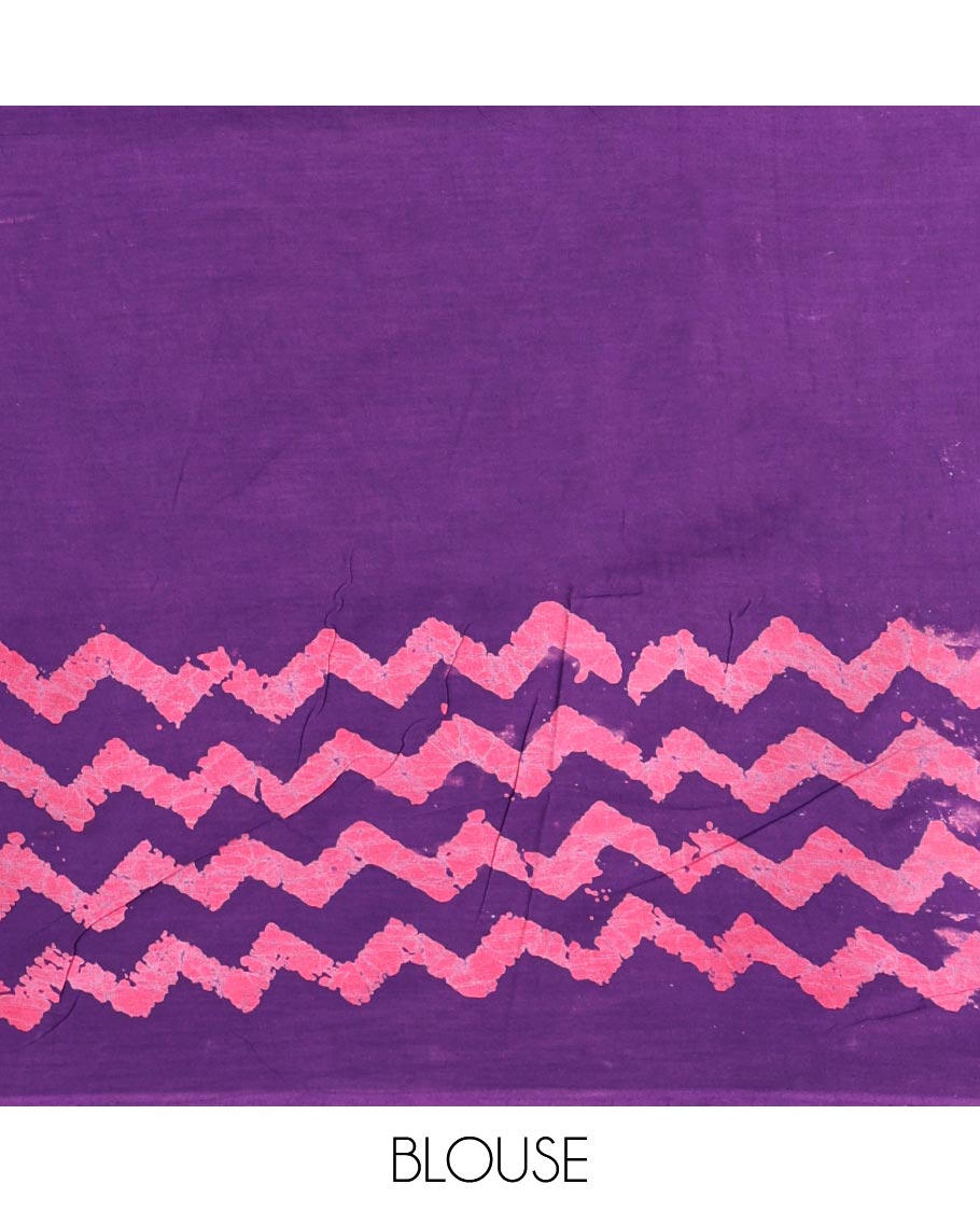 Violet wax batik-style zig-zag printed pure cotton saree, gold zari piping border, human figurines batik printed pallu, and a matching blouse