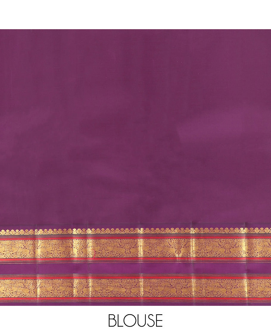 Orange Kanchipuram Silk Saree, Graced with Mayil-Chakram Buttas, a Contrast Korvai Rettai Pettu Border of Muthu, Muthu, and Kuthirai Designs, Traditional Pallu, and a Contrast Blouse