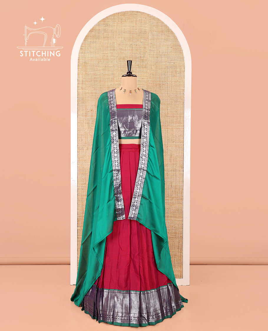 Rani Pink-Green Mercerised Cotton Half-Saree Features Plain with Contrast Traditional Zari Bordered Skirt, Paired with a Matching Blouse, and Comes with a Contrast Bordered Dhavani