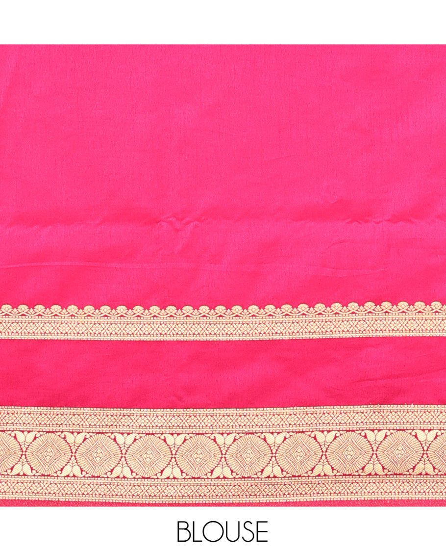 Mustard Yellow Dupion Silk Saree, Embellished with Buttas All Over Its Body, Complemented by Contrast Traditional Border of Paisleys and Chakram Designs, Intricately Designed Pallu, and Paired with a Contrast Blouse