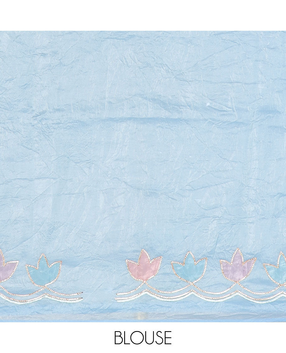 Light blue tissue saree with self scallop border & floral embroidery pallu