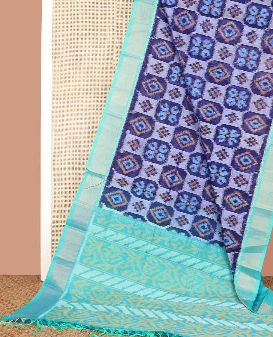 Blue Ikkat Cotton Saree, Accentuated with Ikkat-Style Geometric Patterns All Over Its Body, Complemented by a Contrast Zari Border, Pallu of Geometric Designs in Ikkat Weave, and Paired with a Contrast Blouse