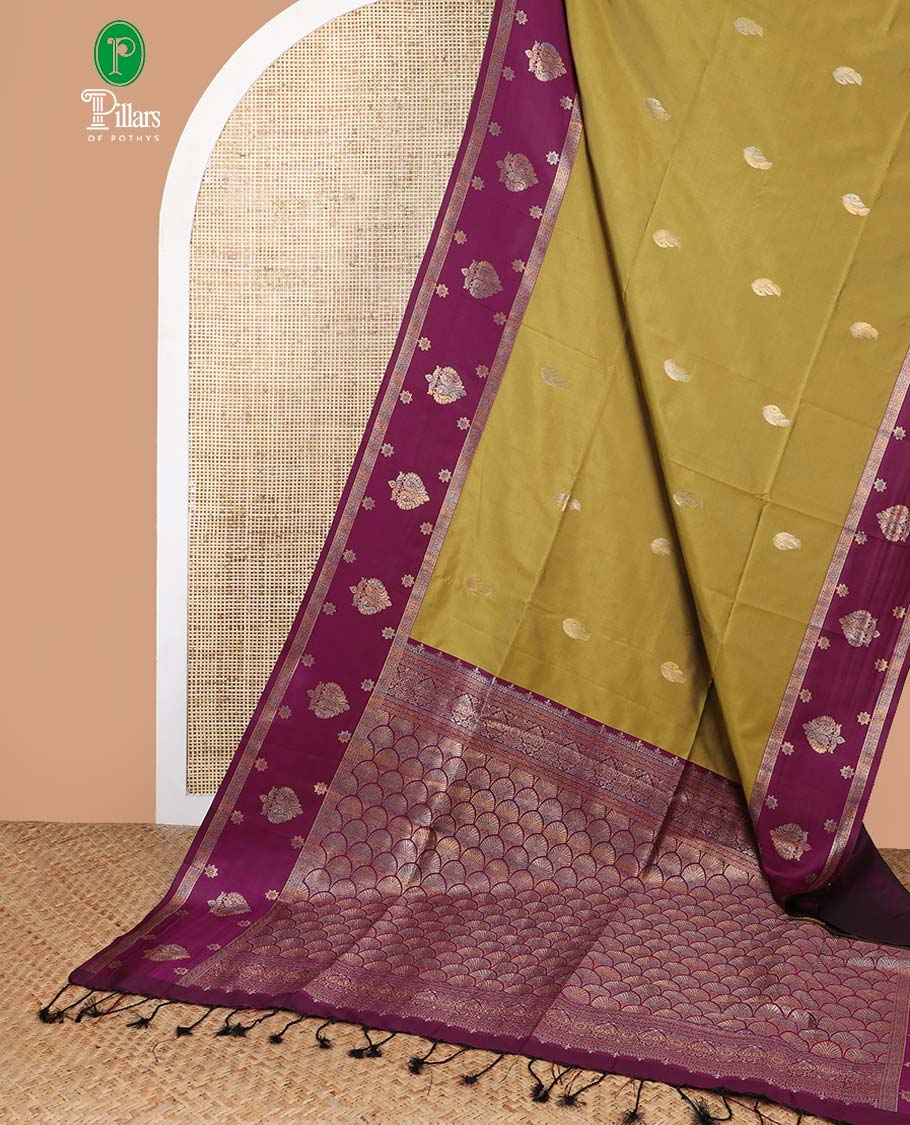 Mehendi green semi soft silk saree with peacock border & rich pallu along with plain blouse