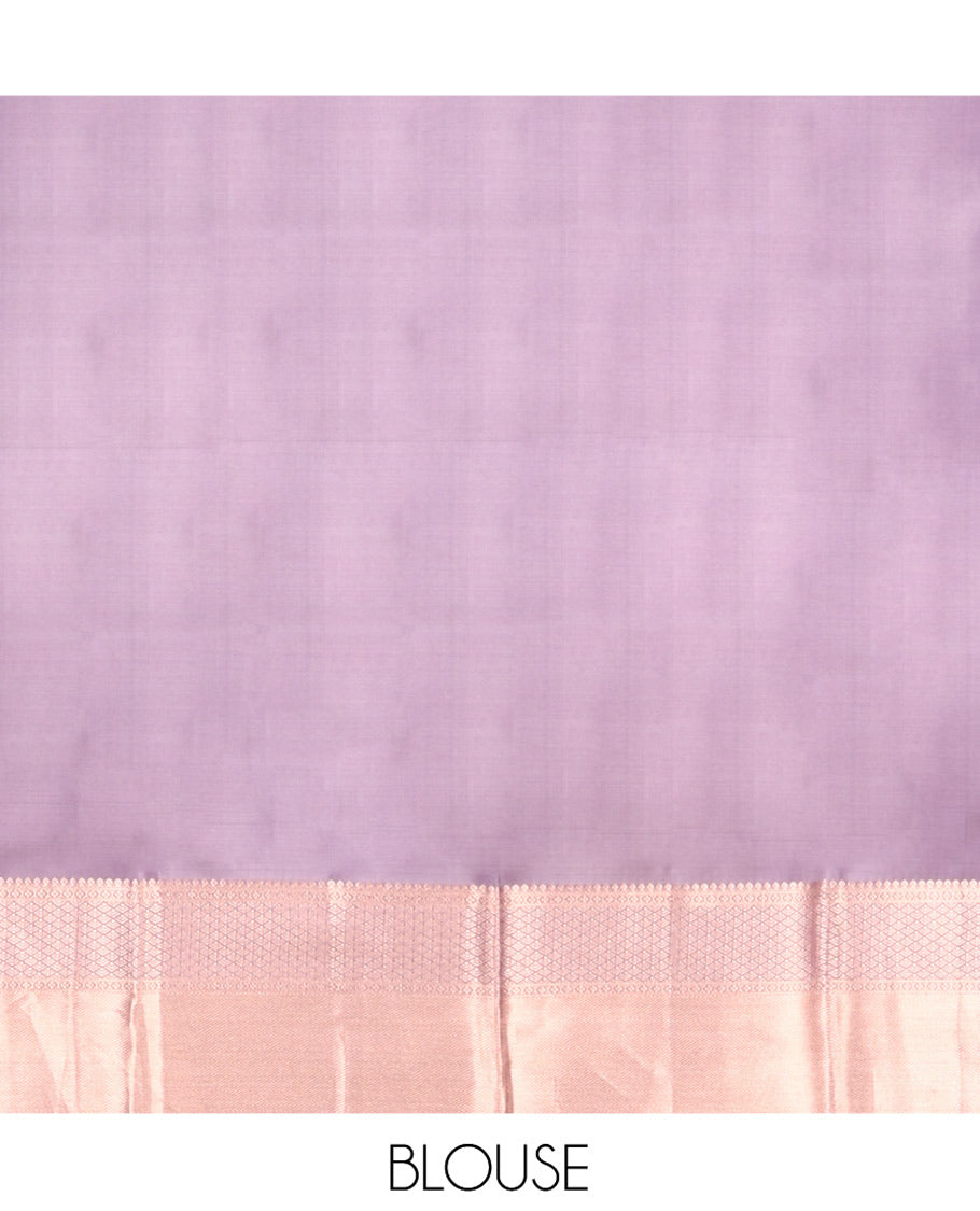 Lavender Vasundhara Silk Saree, Embellished with Floral Jaal Jacquard on Its Body, Highlighted by a Zari Border of Thilakam Mokku, Lavangam, and Jaal Designs, Grandly Woven Jaal Pallu, and Paired with a Matching Blouse