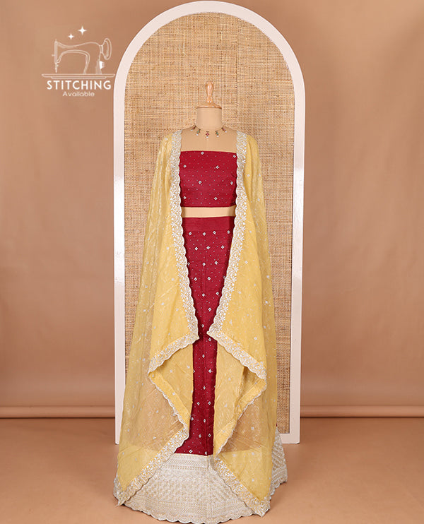 Red half-saree, floral motifs embroidered semi raw silk top, matching embroidered blouse, and contrast scallop embroidered georgette dhavani