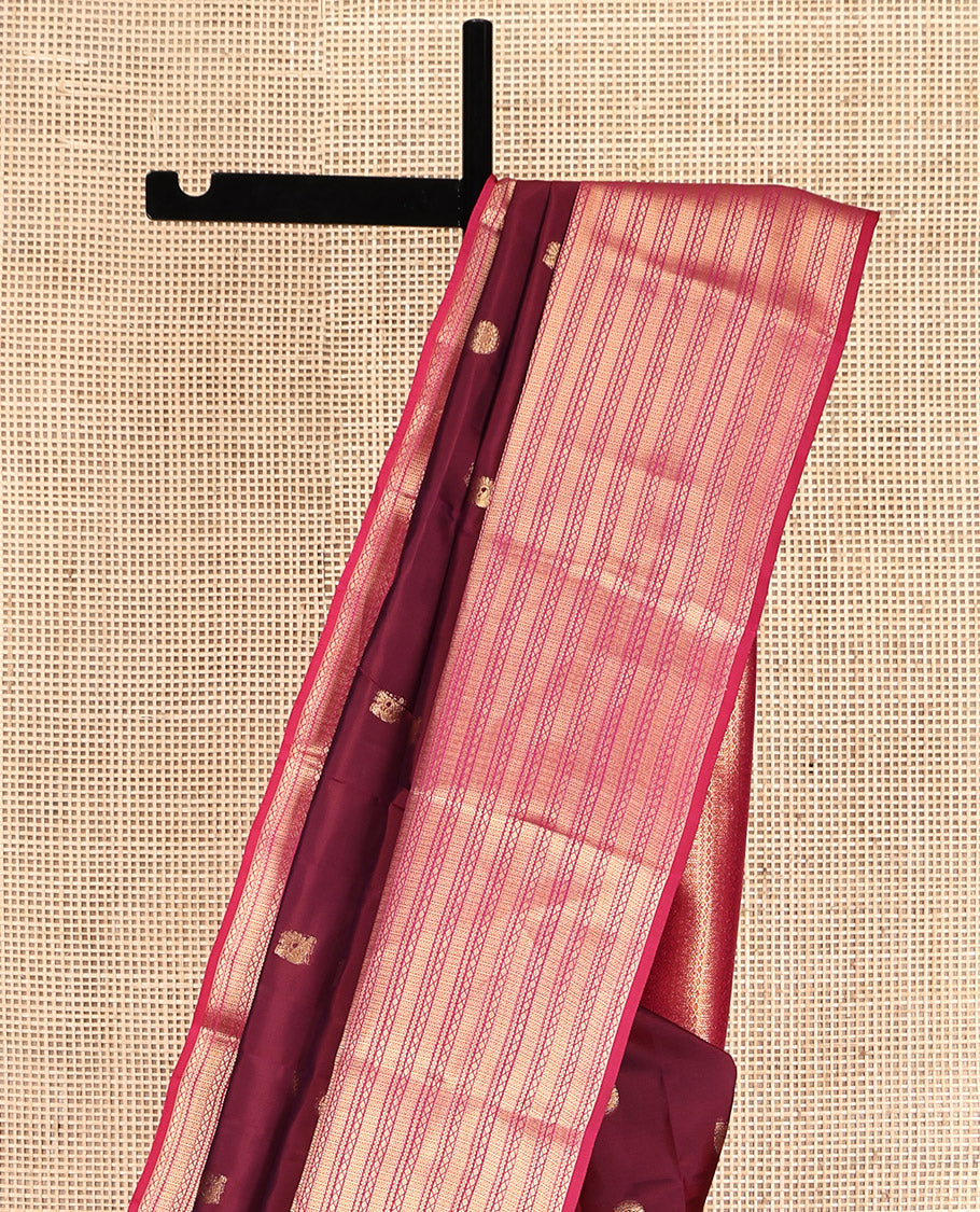 Maroon Vasundhara Lite Silk Mix Saree Features Mayil-Chakram Buttas, Complemented by a Contrast Border of Neli and Diamond, a Geometric Pallu, and a Contrast Blouse