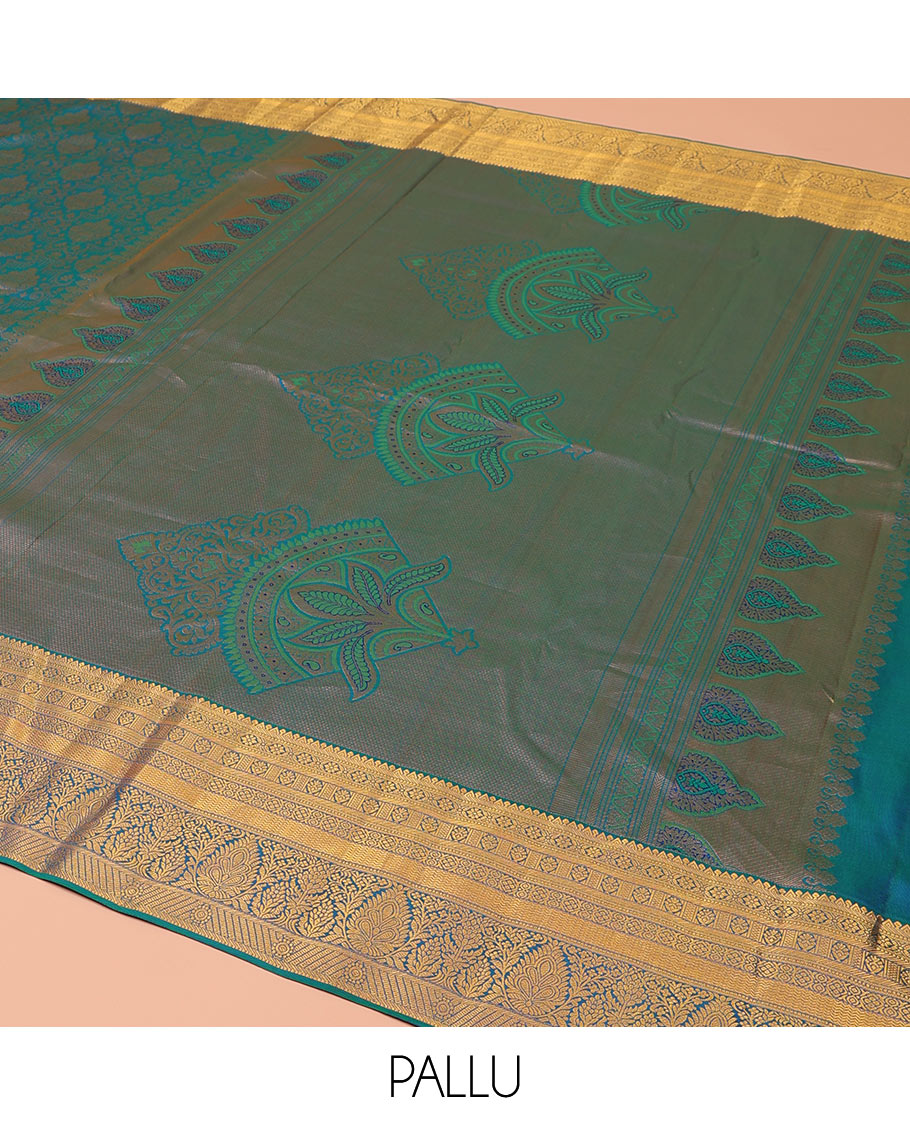 Blue Kanchipuram Wedding Silk Saree, Ornamented with Jacquard Design on Its Body, Highlighted by Zari Border of Rekku, Banaras, Cross Kamalam, Vanki, and Kodi Visiry Designs, Meticulously Crafted Pallu, and Paired with a Matching Blouse