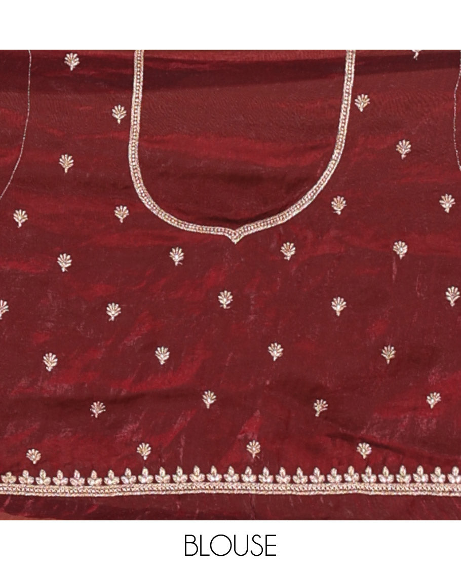 Wine half-saree, buttas and flora-fauna embroidered bordered velvet organza skirt, a matching velvet organza blouse, and a contrast embroidered scallop syska georgette dhavanif