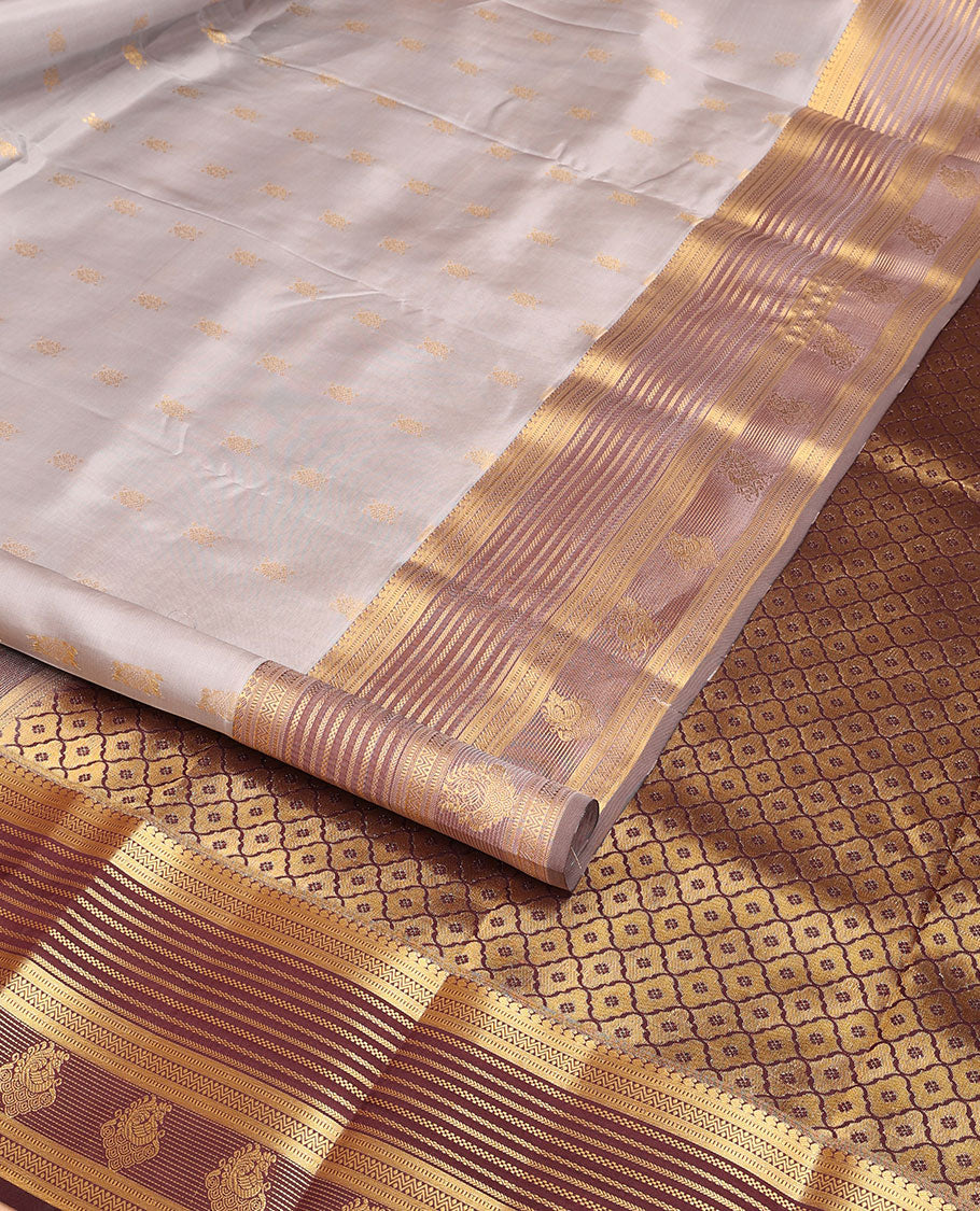 Grey floral buttas vasundhara elite silk saree with contrast intricate zari design border & ogee design pallu