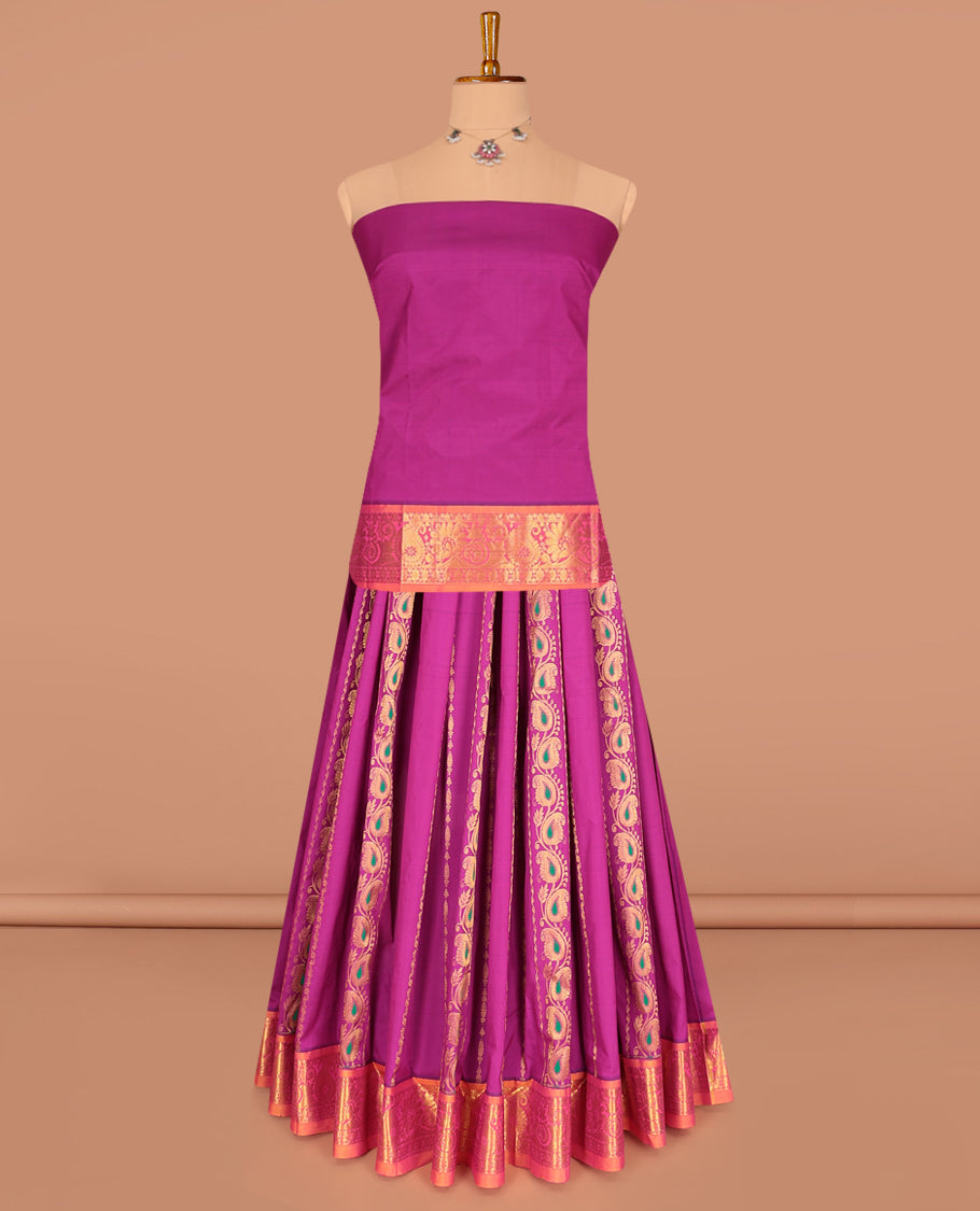 Pink Art Silk Pavadai Material Set, Embellished with Zari Designs on Its Skirt, Complemented by a Contrast Traditional Zari Border, and a Matching Blouse