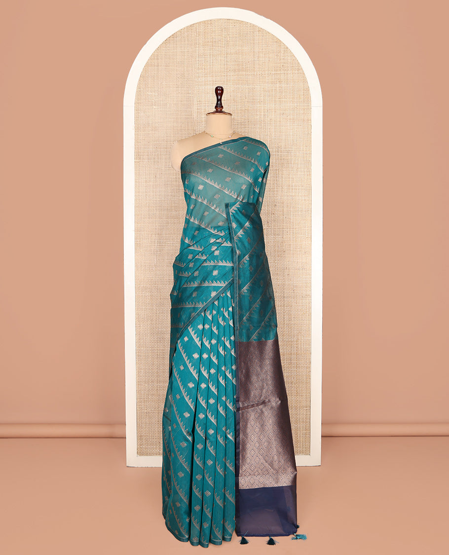 Borderless Green Chanderi Cotton Saree, Adorned with Zari Buttas and Temple Stripes on Its Body, Complemented by Contrast Pallu of Jaal Designs, and Paired with a Contrast Jacquard Blouse