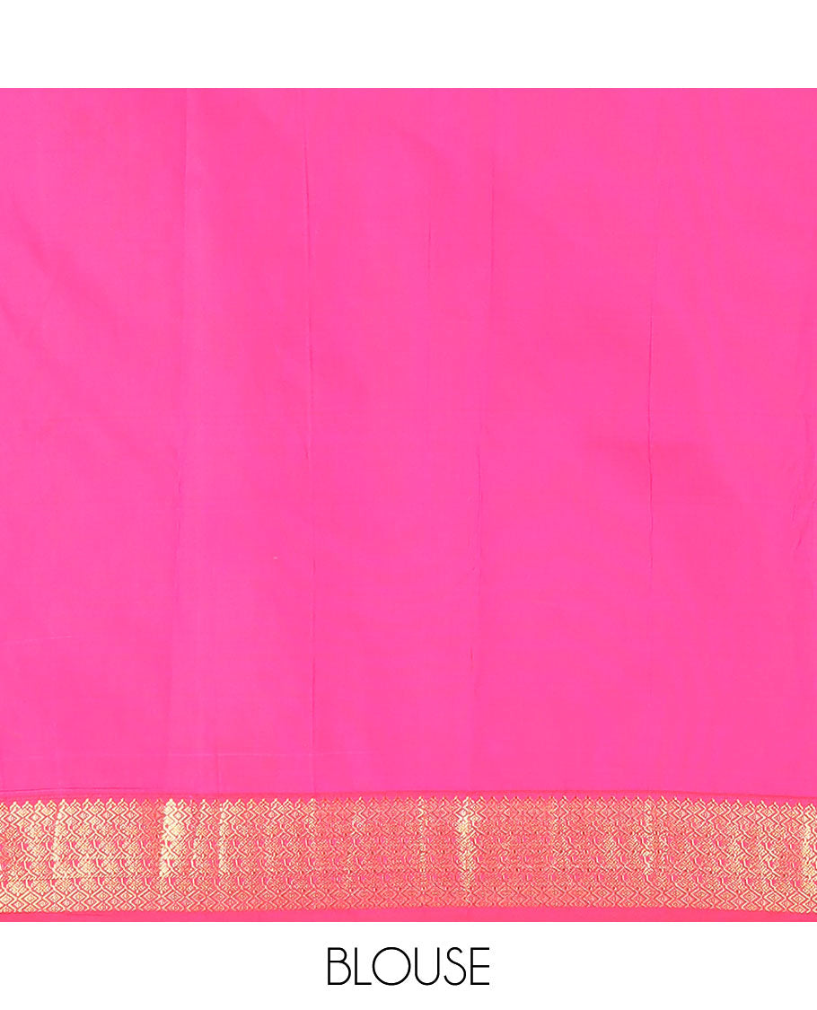 Green buttas with checked budget silk saree, contrast varisai pettu traditional zari border, and intricately woven pallu