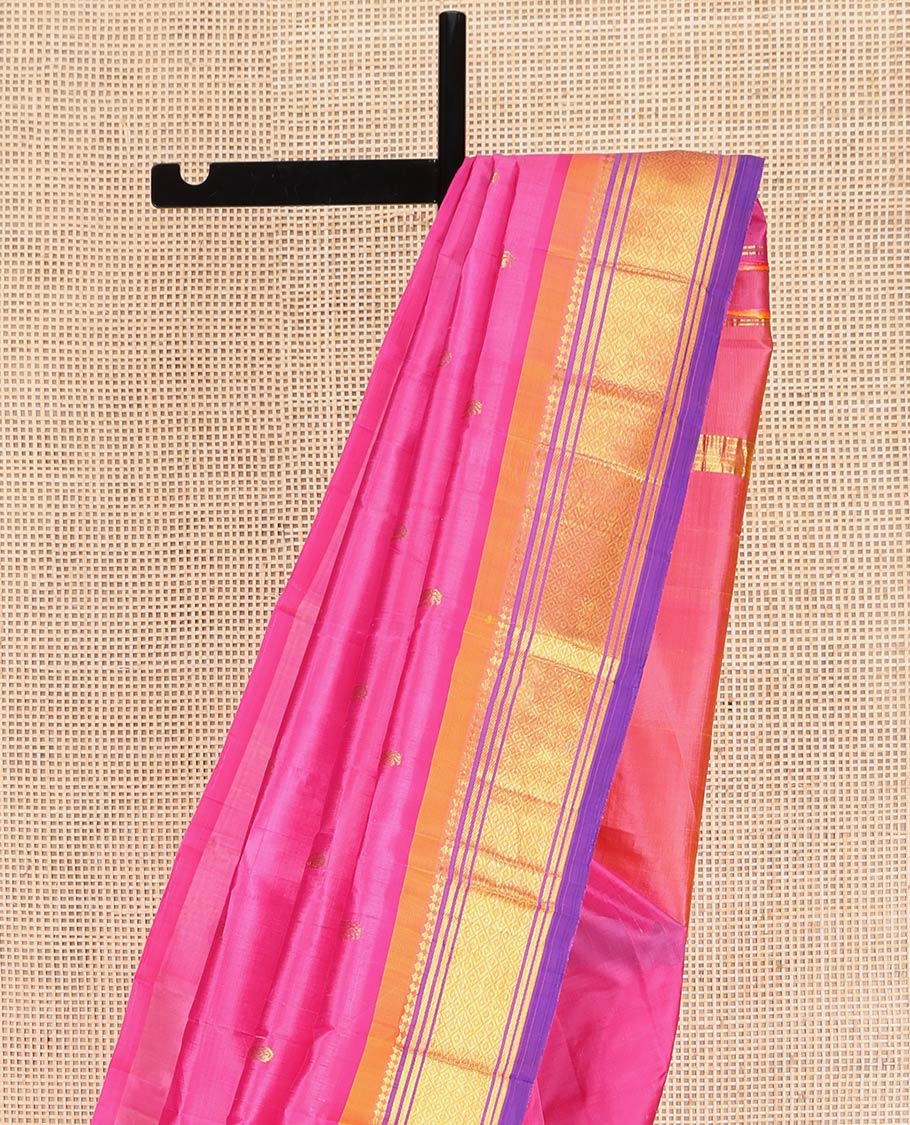 Pink Kanchipuram Silk Saree, Accentuated with Zari Buttas on Its Body, Complemented by a Contrast One-Sided Border of Panner Sombu, Banaras, and Mayil Kann Designs, Pallu of Zari Designs, and Comes Without a Blouse