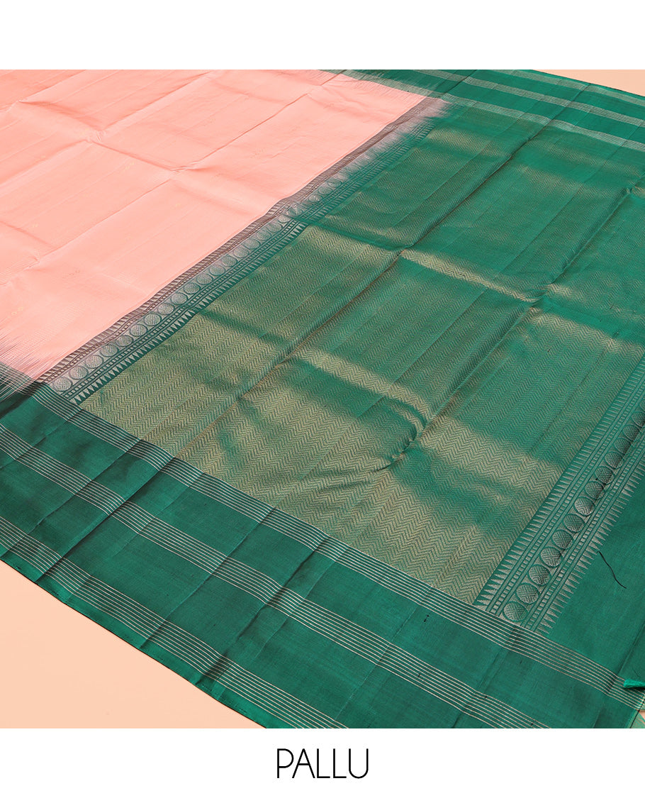 Peach Kanchipuram Silk Saree, Sparsely Sparkled with Buttas, Contrast Uniquely Designed Border, Chevron Striped Pallu, and a Contrast Blouse