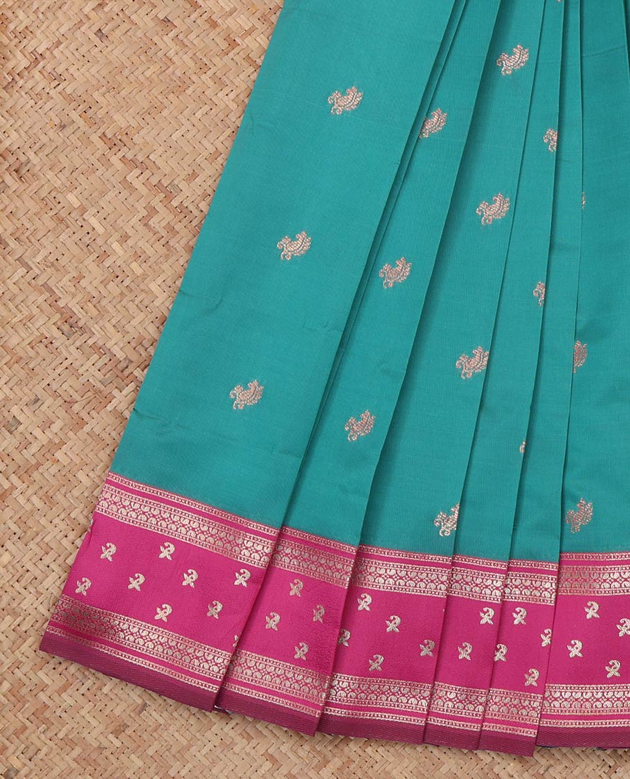 Blue Litchi Saree, Woven with Zari Buttas, a Contrast Traditional Zari Border, Intricately Designed Pallu, and a Contrast Blouse