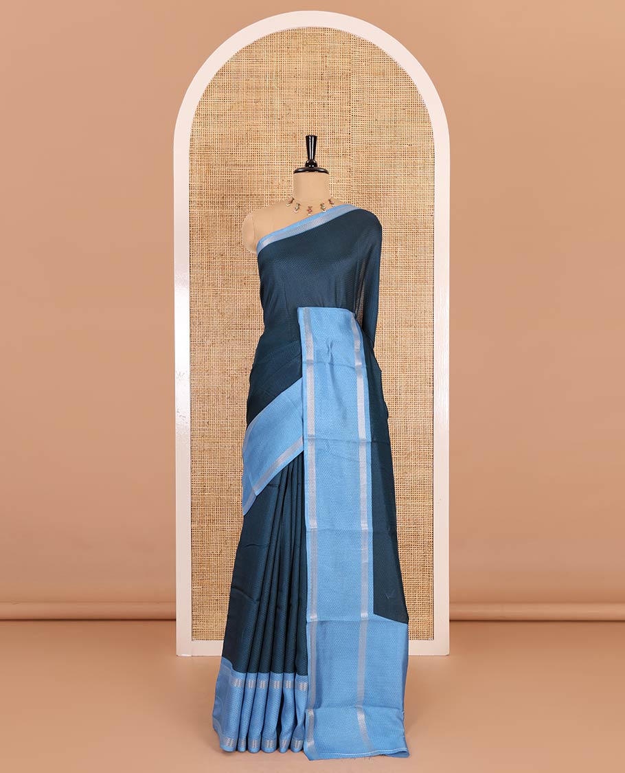 Blue embossed moss chiffon saree, contrast traditional rettai pettu border, embossed pallu, and a contrast embossed blouse