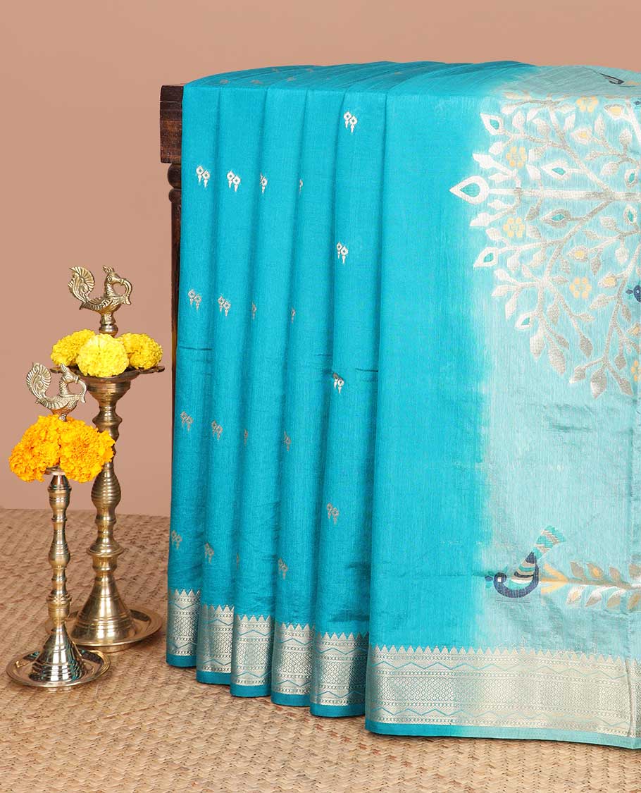 Peacock blue small butta art raw silk saree with bavanchi temple border rich pallu along with vertical stripes blouse