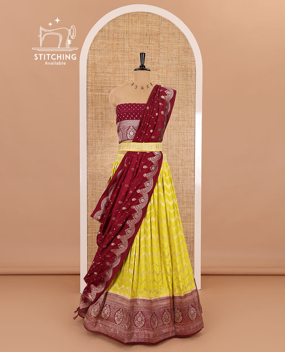 Liril green chiniya crepe half-saree, chevron zari jacquard with contrast intricate patterned stone work bordered skirt, contrast blouse, and a scallop bordered intricate dhavani