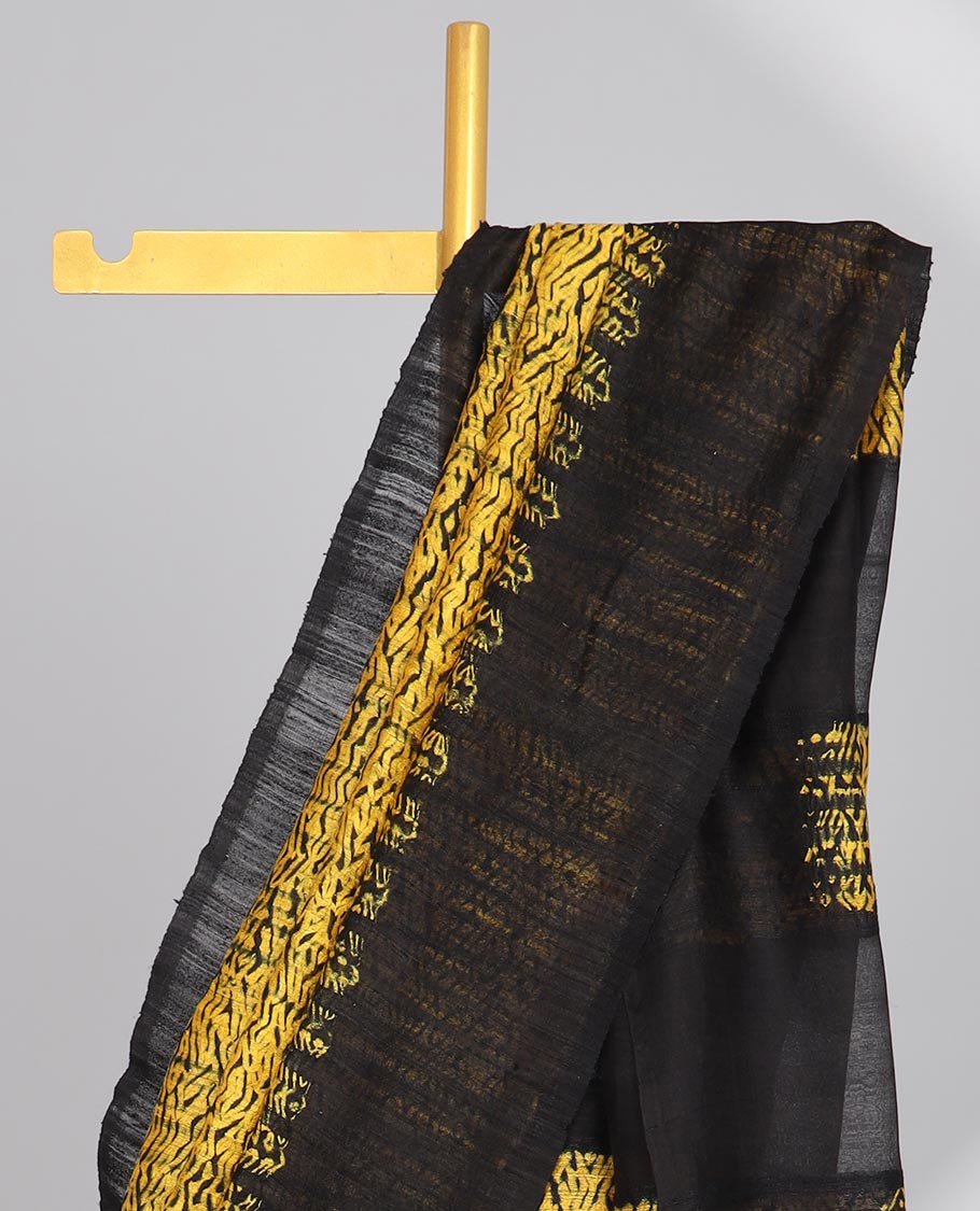 Yellow abstract design matka silk saree with contrast plain border & black abstract design pallu