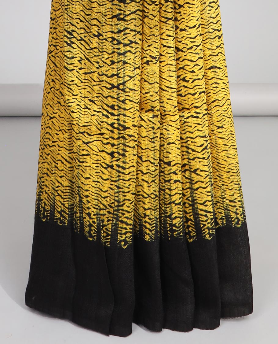 Yellow abstract design matka silk saree with contrast plain border & black abstract design pallu
