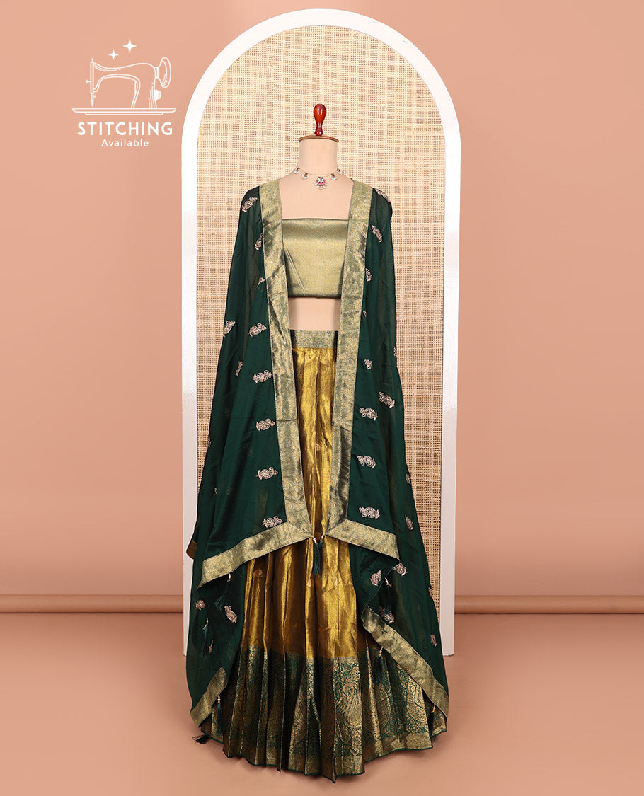 Gold-dark green zari buttas half-saree with contrast Mughal-style paisley motifs woven bordered skirt, brocade blouse, and a zari design dhavani