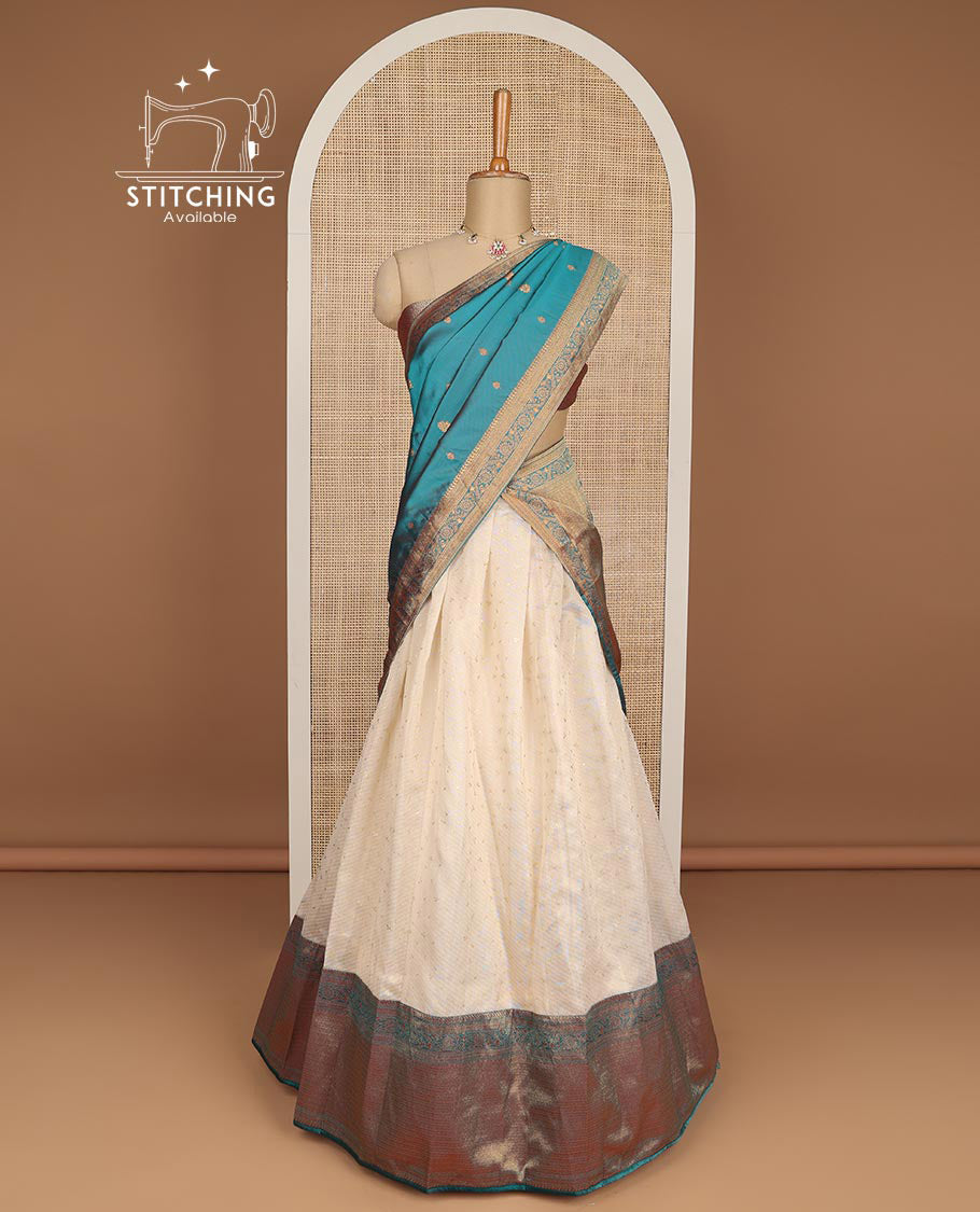White floral jacquard tissue half saree with contrast zari design border, zari design blouse & floral vine design dhavani