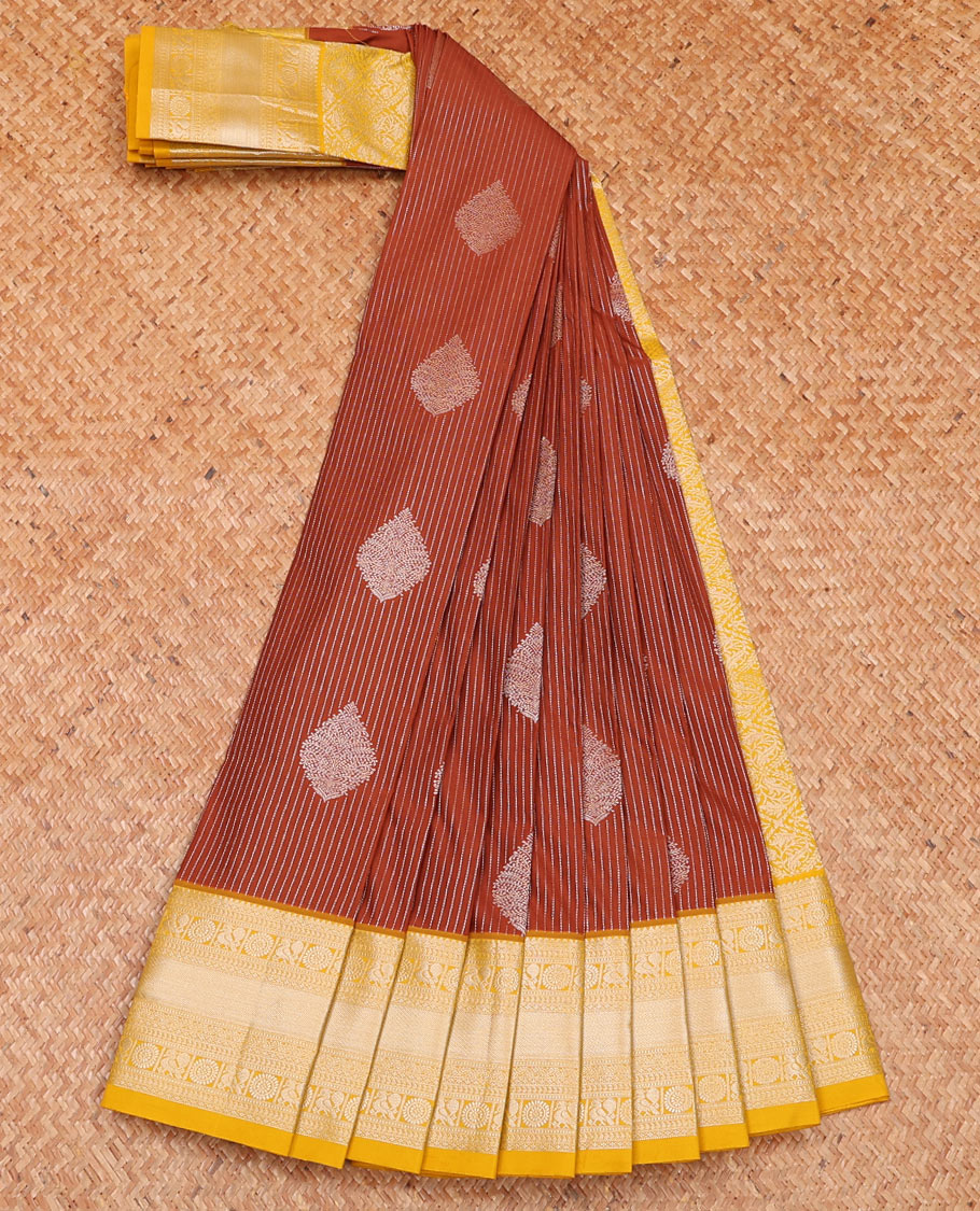 Rust striped and buttas budget silk saree, contrast traditional zari border, and jaal pallu