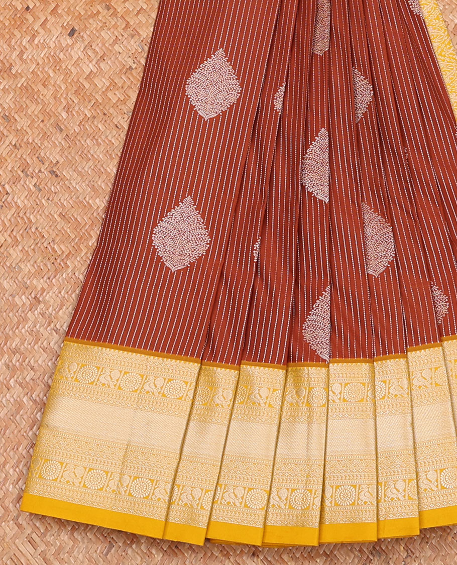 Rust striped and buttas budget silk saree, contrast traditional zari border, and jaal pallu