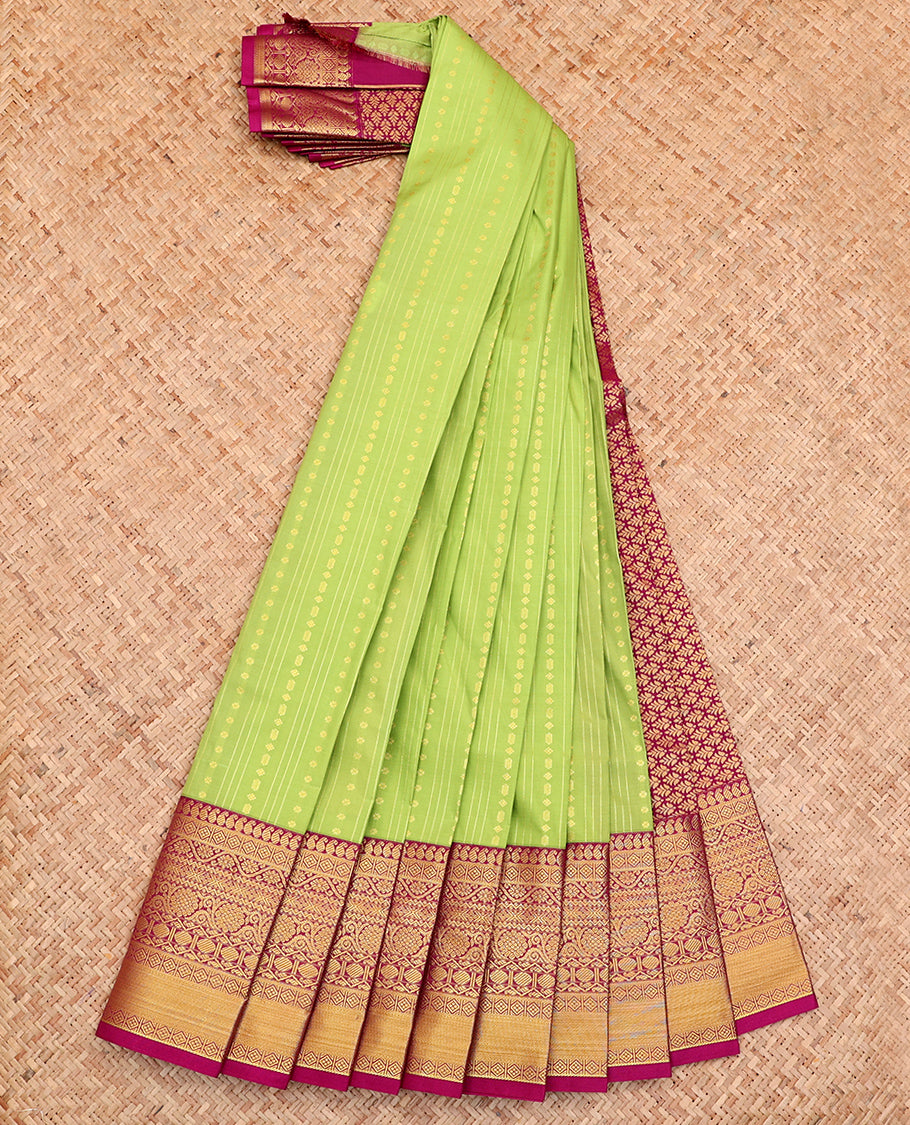 Parrot Green Budget Silk Saree, Detailed with Buttas and Stripes All Over Its Body, Complemented by a Contrast Traditional Zari Design Border, Intricately Designed Pallu, and Paired with a Contrast Blouse